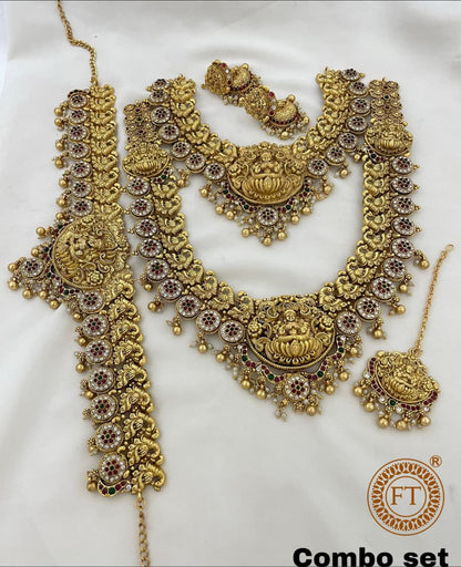 ரூபி கற்கள் பதிக்கப்பட்ட வெள்ளை நிற மணப்பெண் நகைகள் செட்