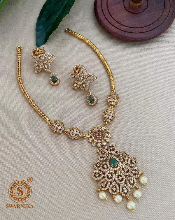 PEACOCK WITH GREEN STONE